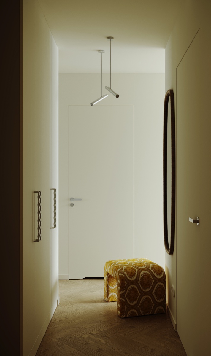 Biały korytarz z czarno-białą wzorzystą podłogą